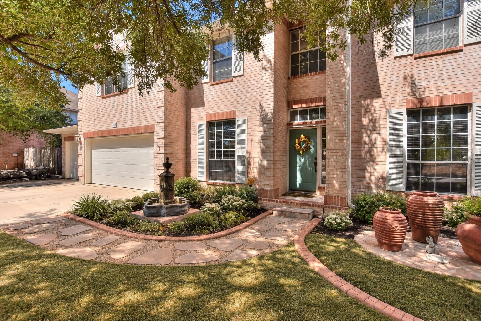 455 Logan Road Georgetown, TX 78628 - Photo 1 of 38 Grass and a few extra bushes were added virtually.