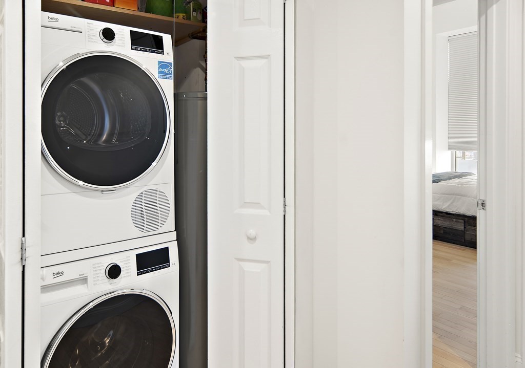 1 Garden Street, Unit FOUR Boston, MA 02114 - Photo 11 of 14 a utility room with dryer and washer