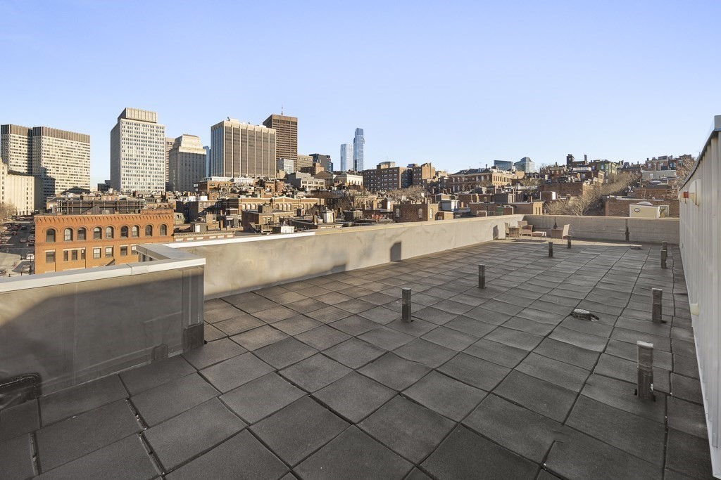1 Garden Street, Unit FOUR Boston, MA 02114 - Photo 12 of 14 a view of terrace with city view