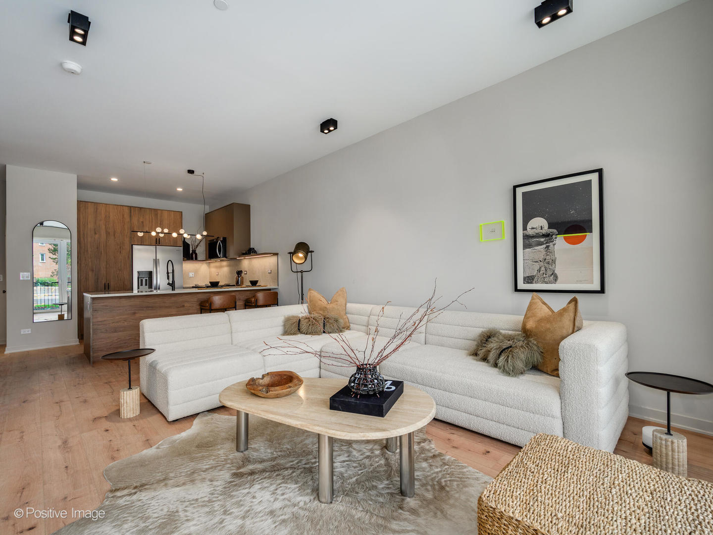 1235 North Ashland Avenue, Unit 302 Chicago, IL 60622 - Photo 4 of 25 a living room with furniture and a wooden floor