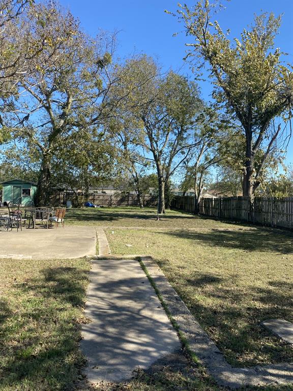 Tbd Thomas Street Terrell, TX 75160 - Photo 2 of 4 a view of a swimming pool with an outdoor space and seating area