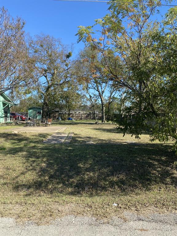 Tbd Thomas Street Terrell, TX 75160 - Photo 3 of 4 a view of outdoor space with trees