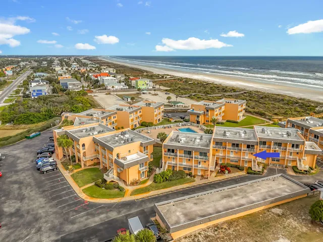 a view of a swimming pool with an ocean view