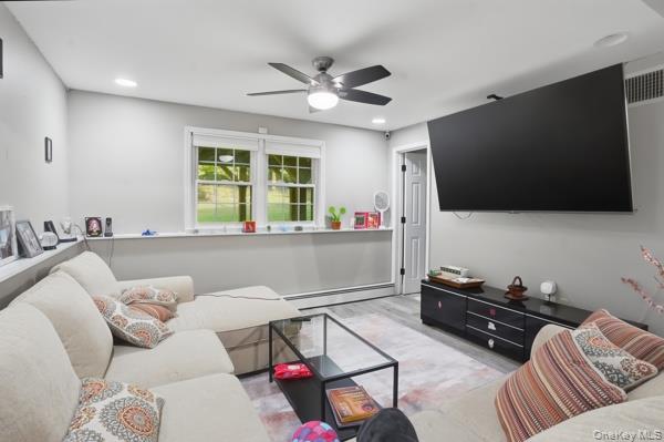 31 Laura Road Monroe, NY 10950 - Photo 34 of 39 a living room with furniture and a flat screen tv