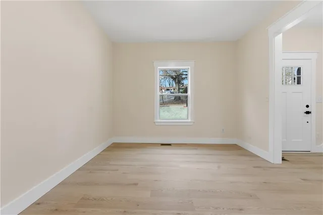 an empty room with windows
