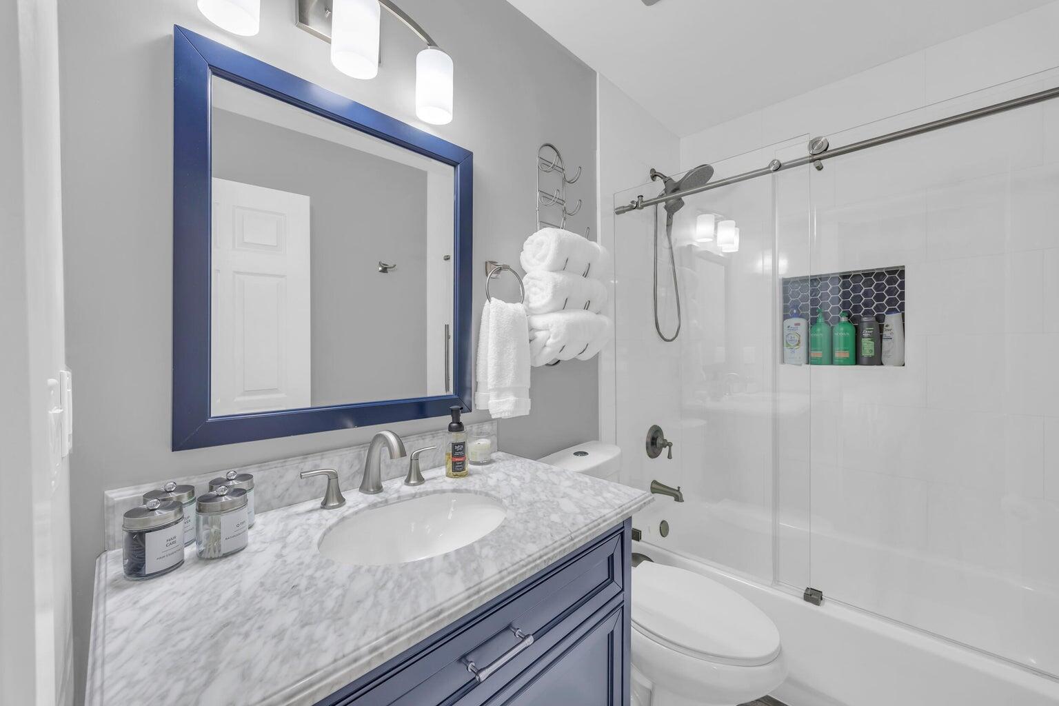170 Timberwalk Trail Jupiter, FL 33458 - Photo 24 of 28 a bathroom with a granite countertop sink toilet and shower