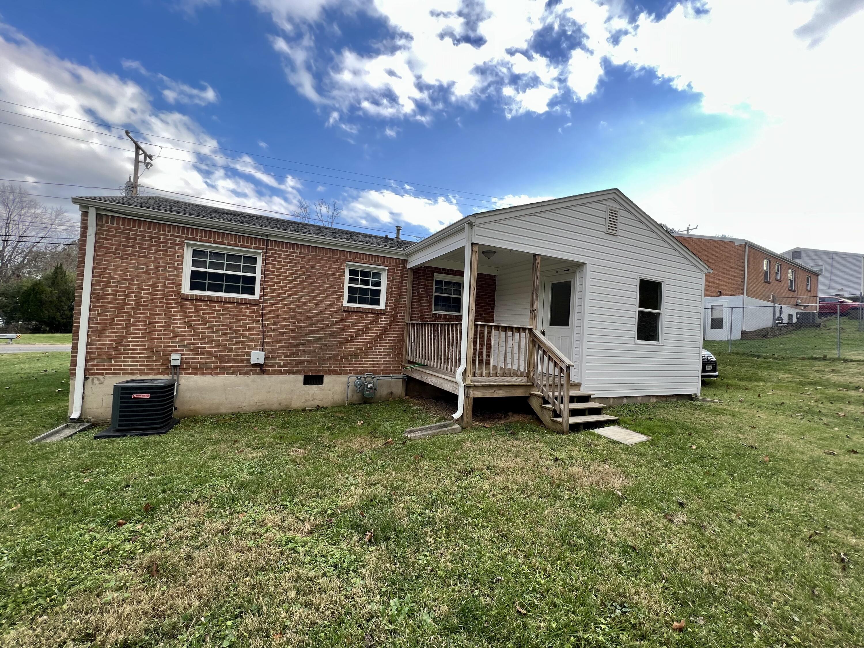 5721 Green Ridge Road Roanoke, VA 24019 - Photo 12 of 16 a view of a house with a yard