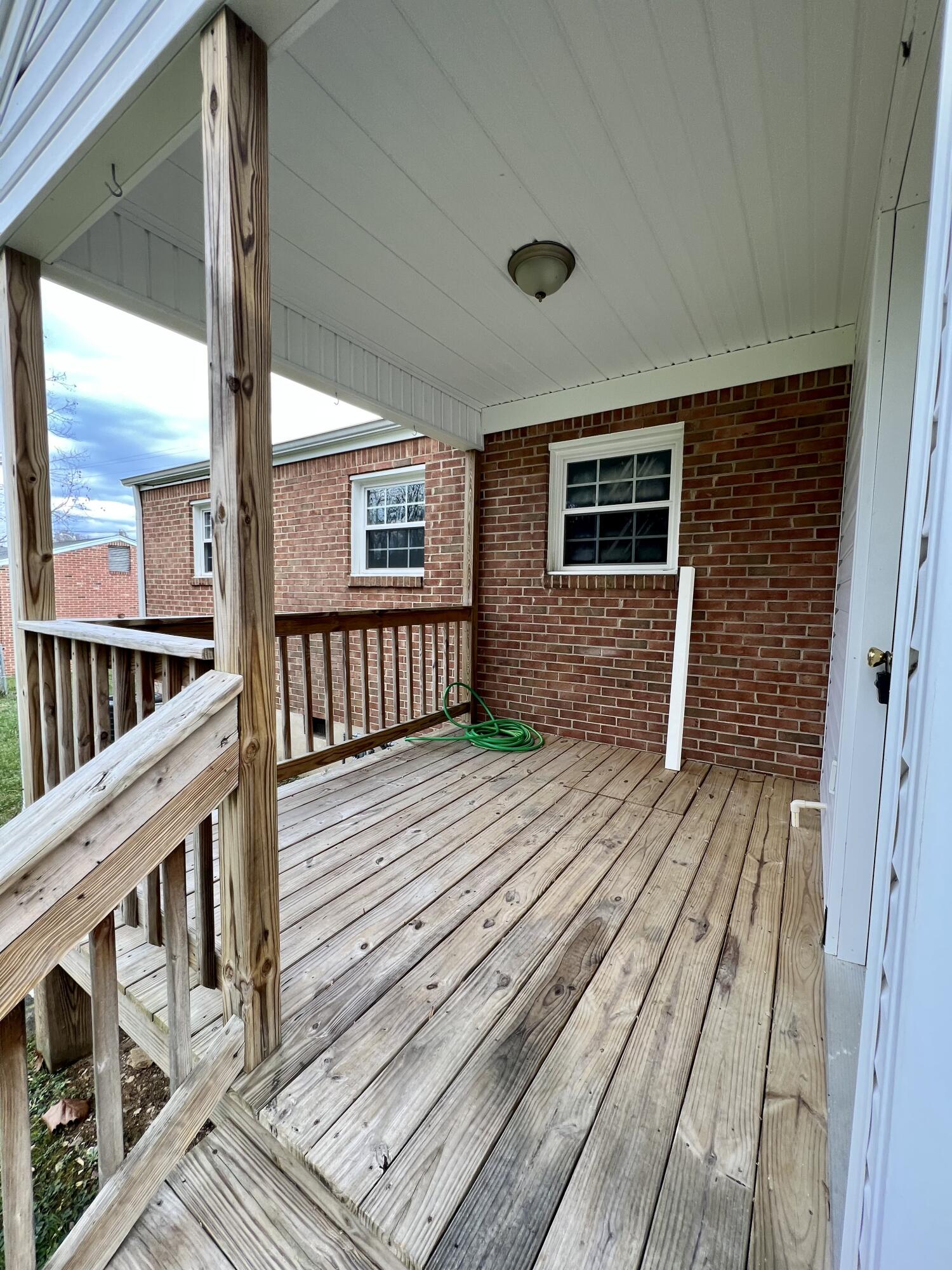 5721 Green Ridge Road Roanoke, VA 24019 - Photo 13 of 16 a view of a balcony with wooden floor