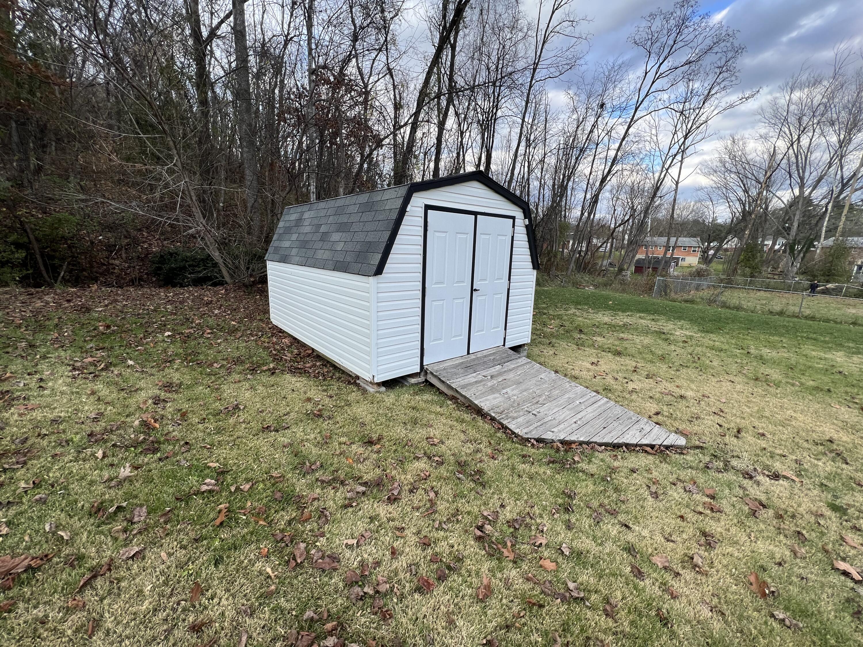 5721 Green Ridge Road Roanoke, VA 24019 - Photo 15 of 16 a view of a tiny house with a yard