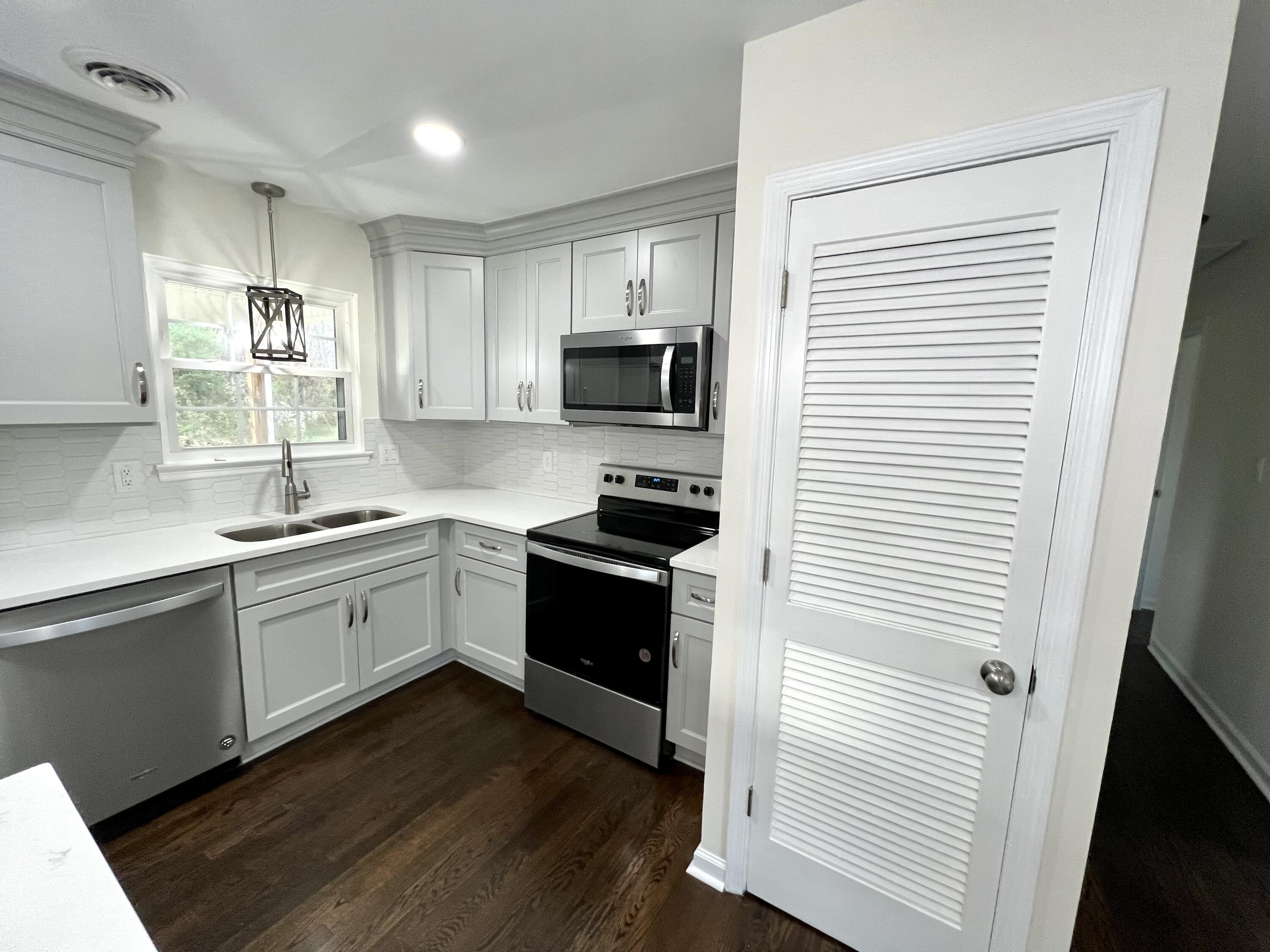 5721 Green Ridge Road Roanoke, VA 24019 - Photo 3 of 16 a kitchen with a refrigerator and a stove top oven