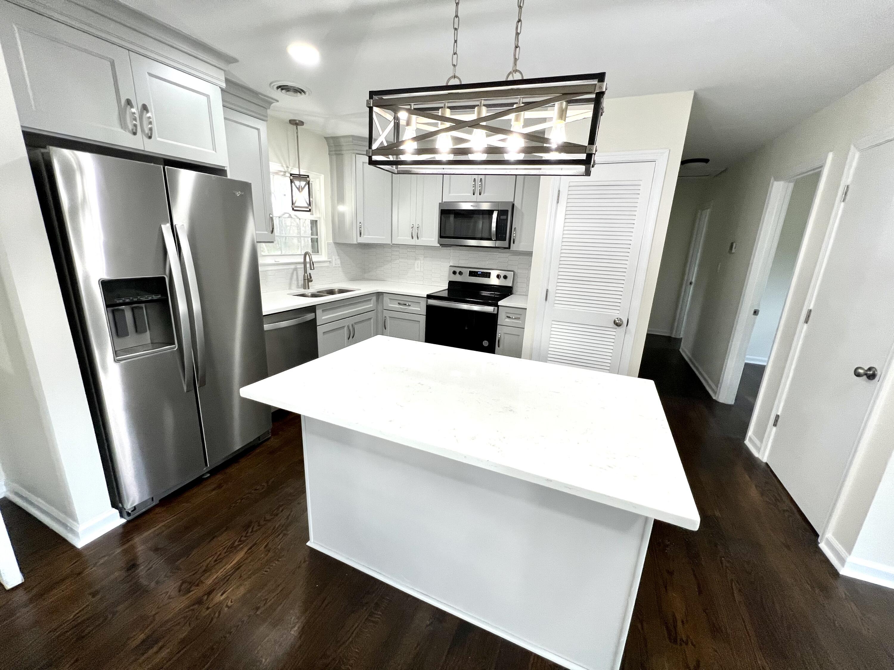 5721 Green Ridge Road Roanoke, VA 24019 - Photo 5 of 16 a kitchen with stainless steel appliances a refrigerator and a stove