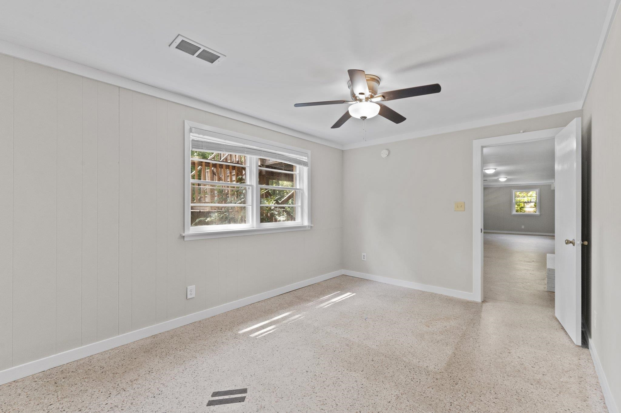3605 Octavia Street Raleigh, NC 27606 - Photo 15 of 50 a view of an empty room with a window