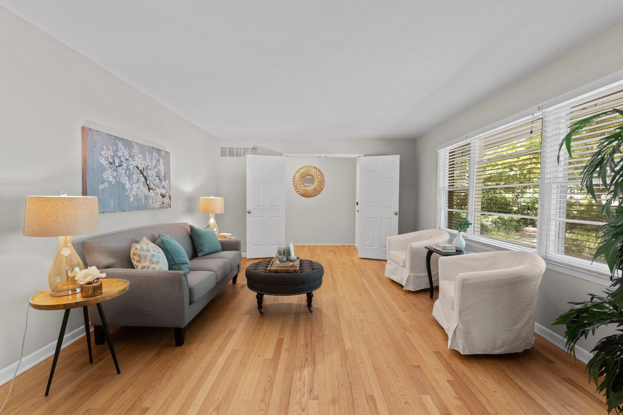 3605 Octavia Street Raleigh, NC 27606 - Photo 2 of 50 a living room with furniture and a table