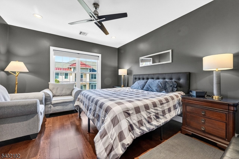119 River Road Somerville, NJ 08876 - Photo 23 of 30 a bedroom with a bed and a couch