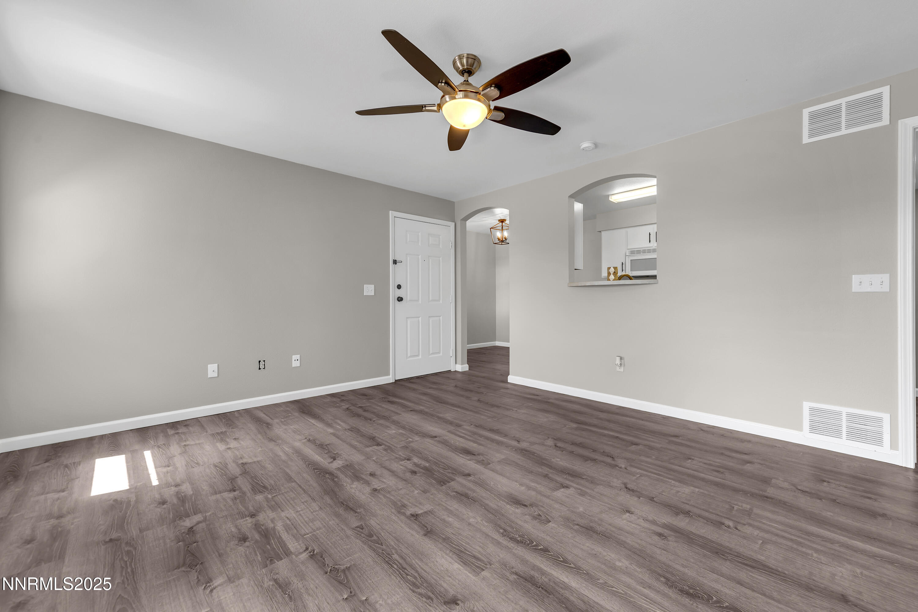 6850 Sharlands Avenue, Unit W 2133 Reno, NV 89523 - Photo 5 of 24 Sharlands W2133 living room and front do