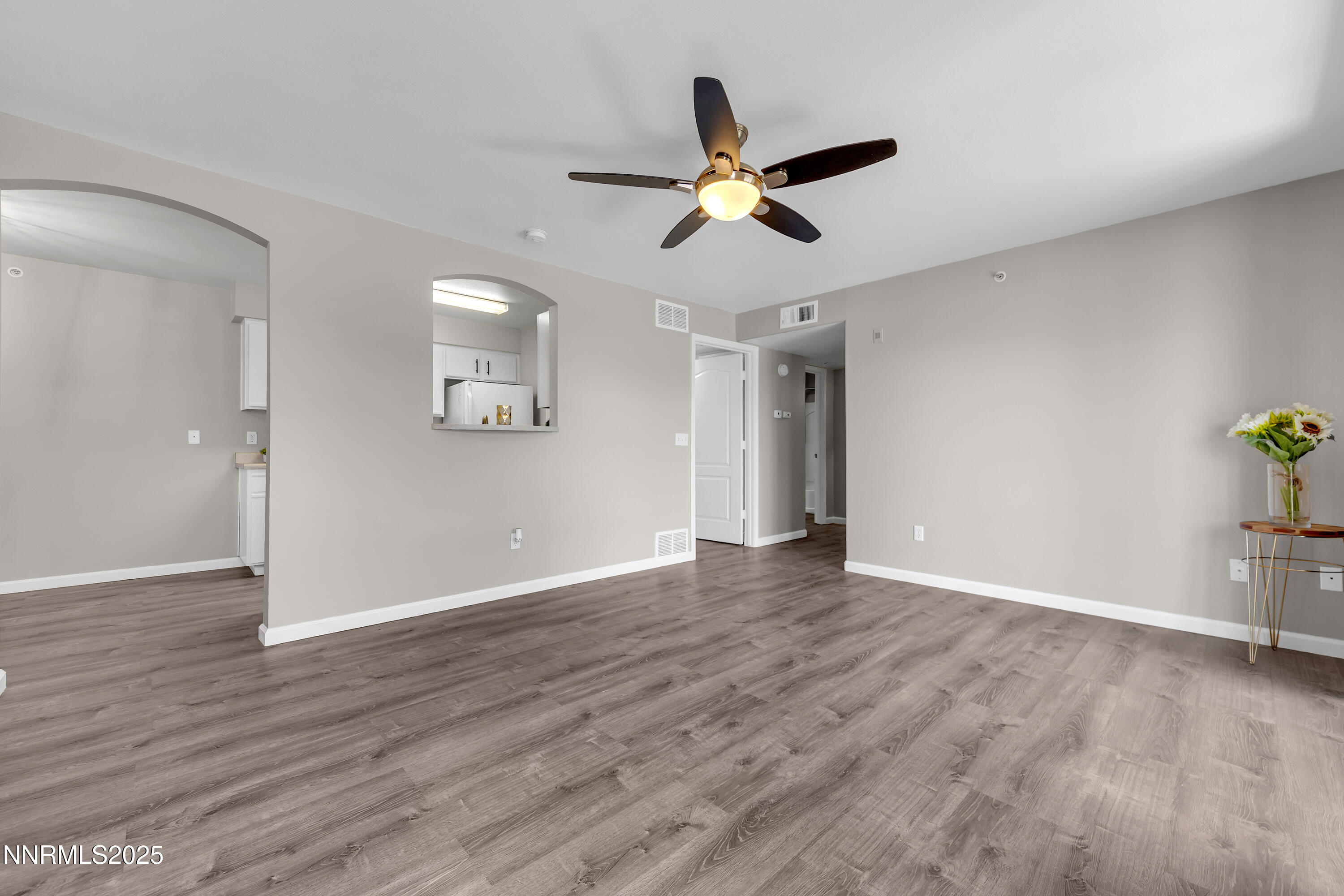 6850 Sharlands Avenue, Unit W 2133 Reno, NV 89523 - Photo 6 of 24 Sharlands W2133 living room and kitchen