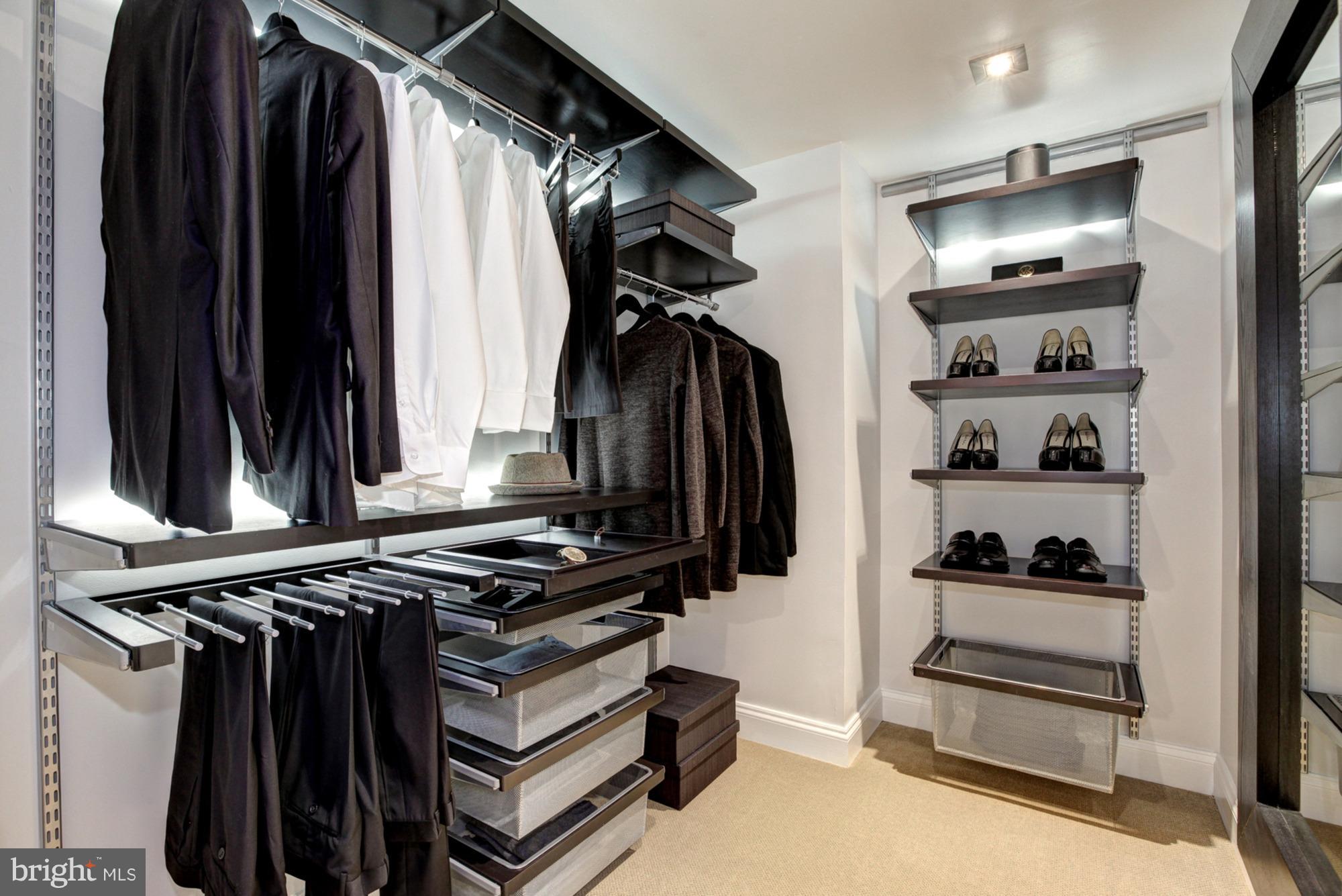 11710 Old Georgetown Road, Unit 208 North Bethesda, MD 20852 - Photo 10 of 28 a view of walk in closet with clothes and shoes