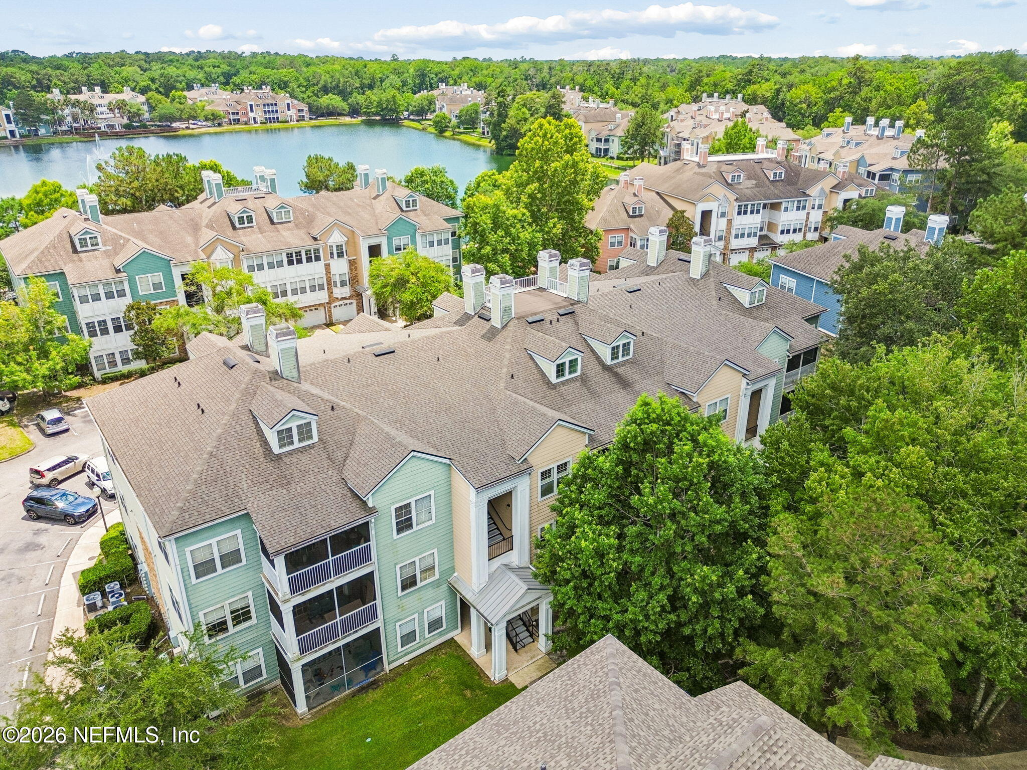 8550 Touchton Road, Unit 511 Jacksonville, FL 32216 - Photo 2 of 63 an aerial view of a house with outdoor space and lake view