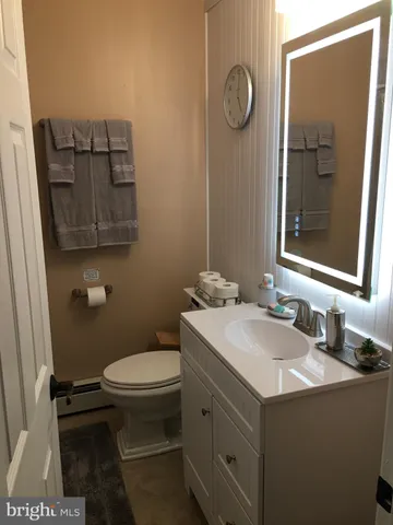 a bathroom with a sink and a toilet
