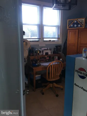 a room with furniture and a window