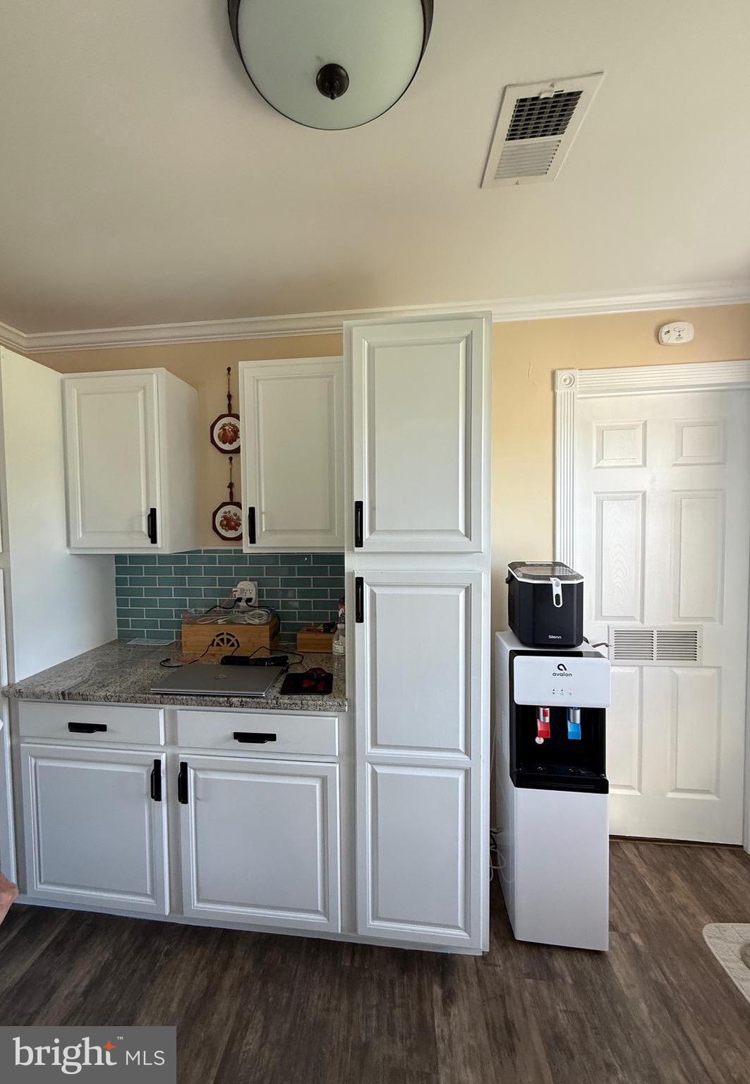 39030 Chaptico Road Mechanicsville, MD 20659 - Photo 17 of 23 a kitchen with a refrigerator and a stove top oven