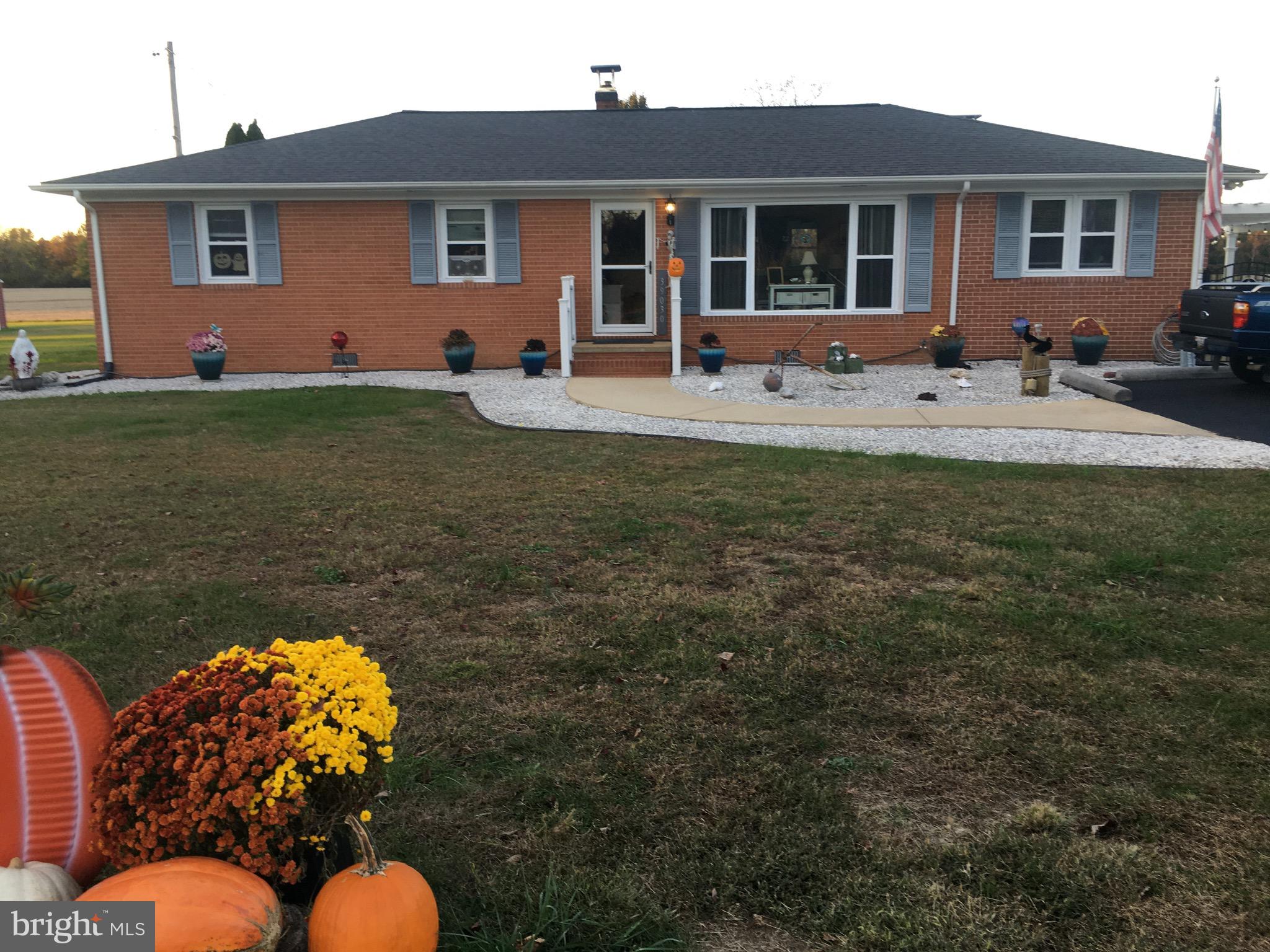 39030 Chaptico Road Mechanicsville, MD 20659 - Photo 2 of 23 a front view of house with yard having seating