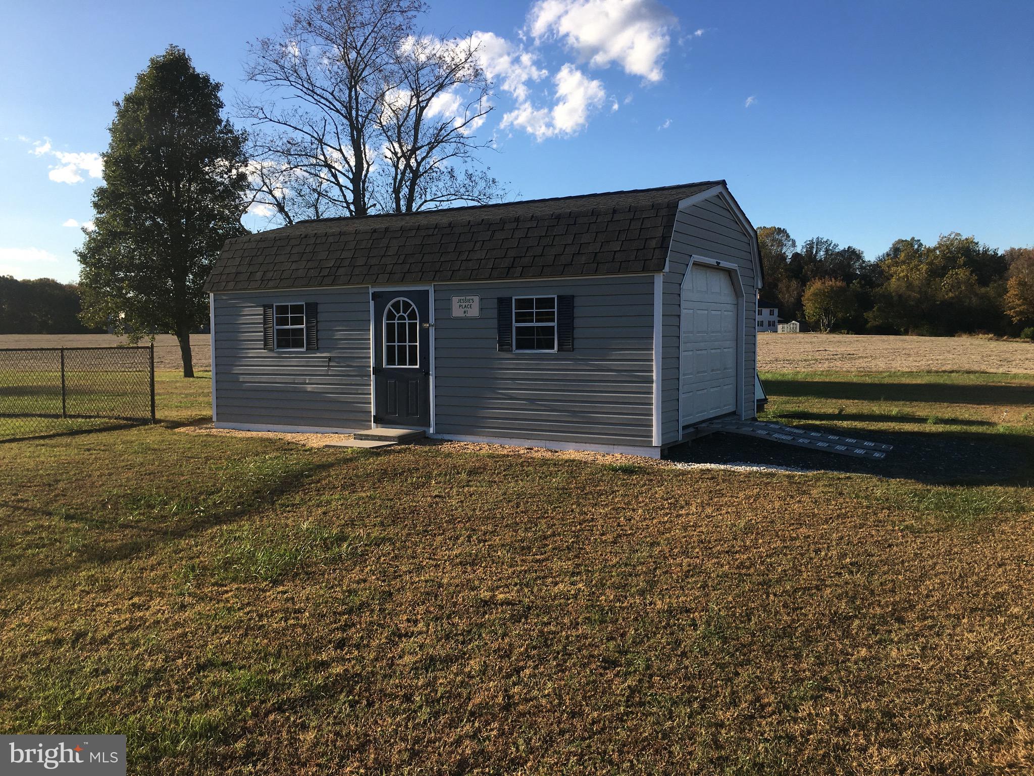 39030 Chaptico Road Mechanicsville, MD 20659 - Photo 6 of 23 a backyard of a house