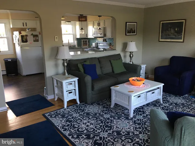 a living room with a couch and a table in it