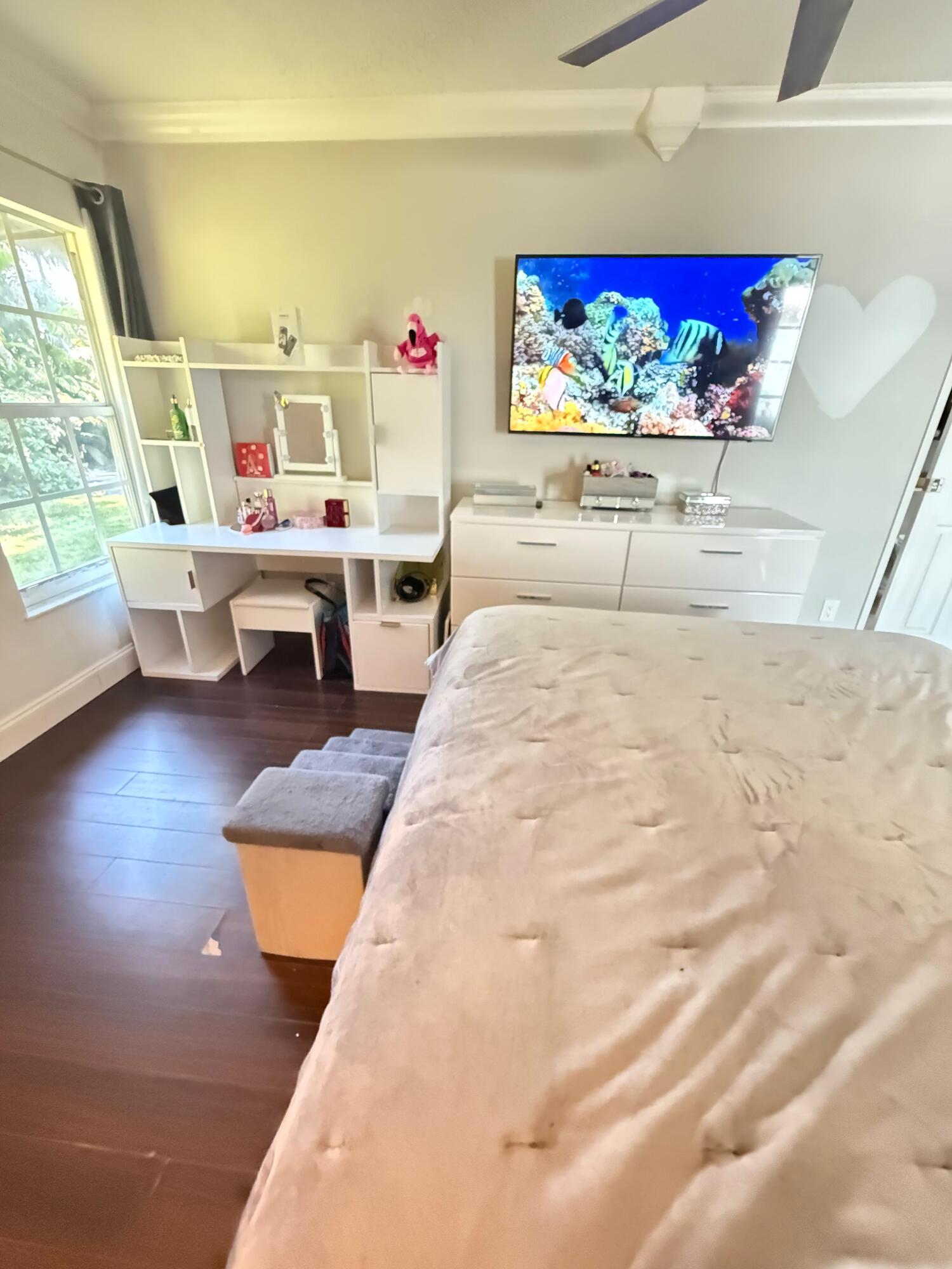 7024 Northwest 63rd Street Tamarac, FL 33321 - Photo 30 of 50 a living room with furniture and a large window