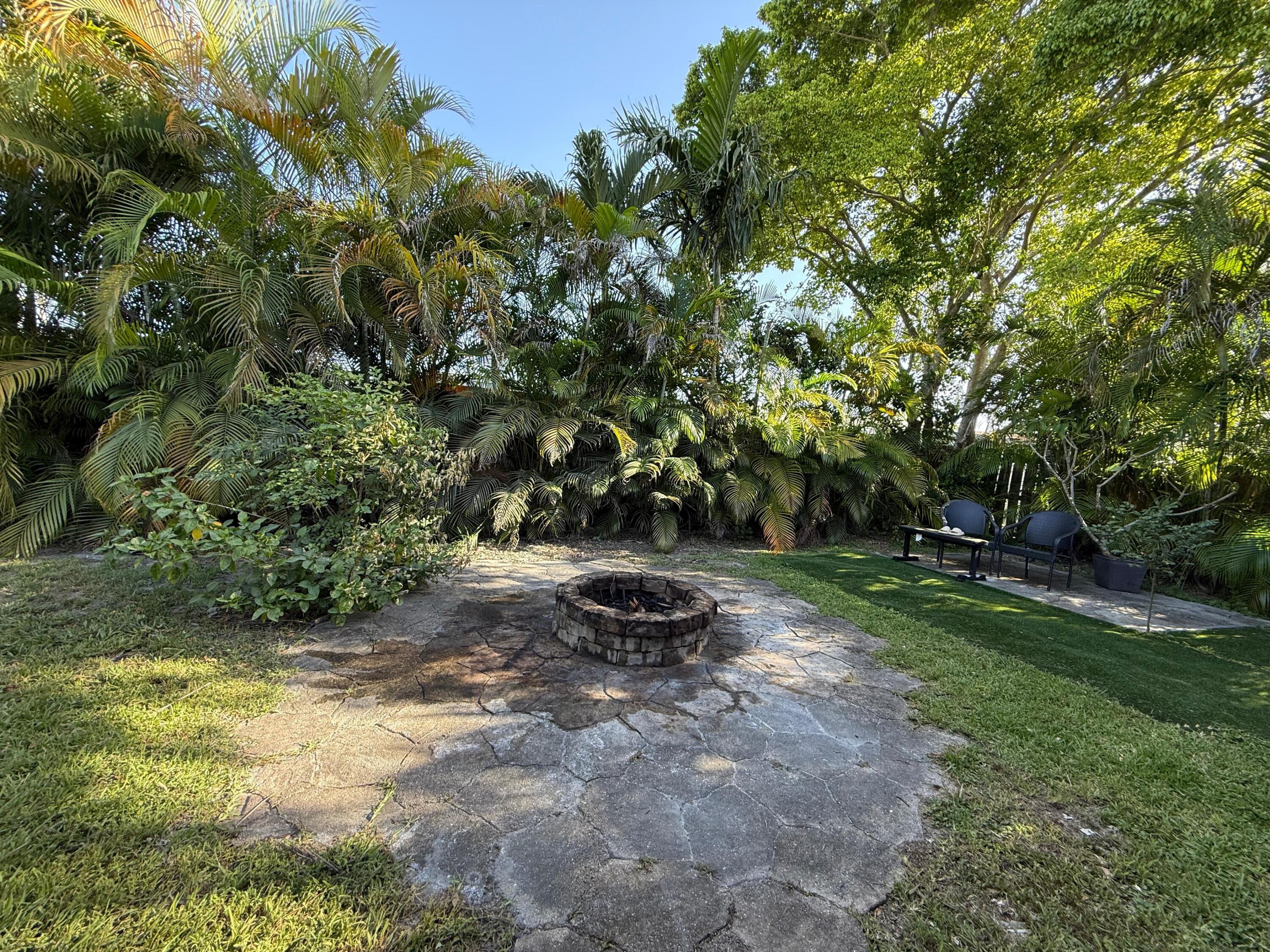 7024 Northwest 63rd Street Tamarac, FL 33321 - Photo 4 of 50 a view of a park with large trees