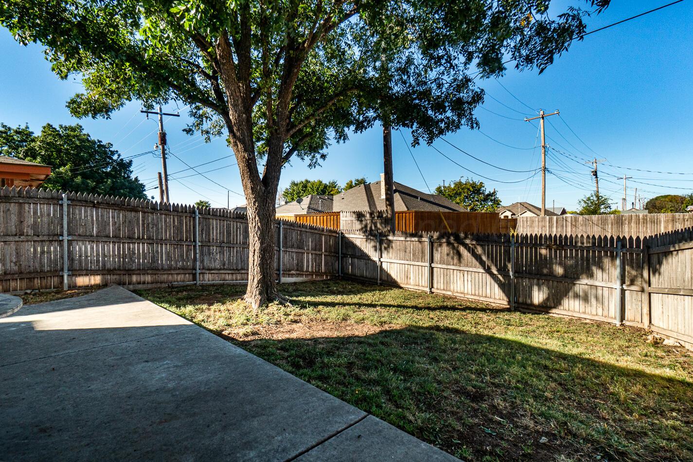 5702 South Milam Street Amarillo, TX 79110 - Photo 20 of 22 a view of a park with iron fence