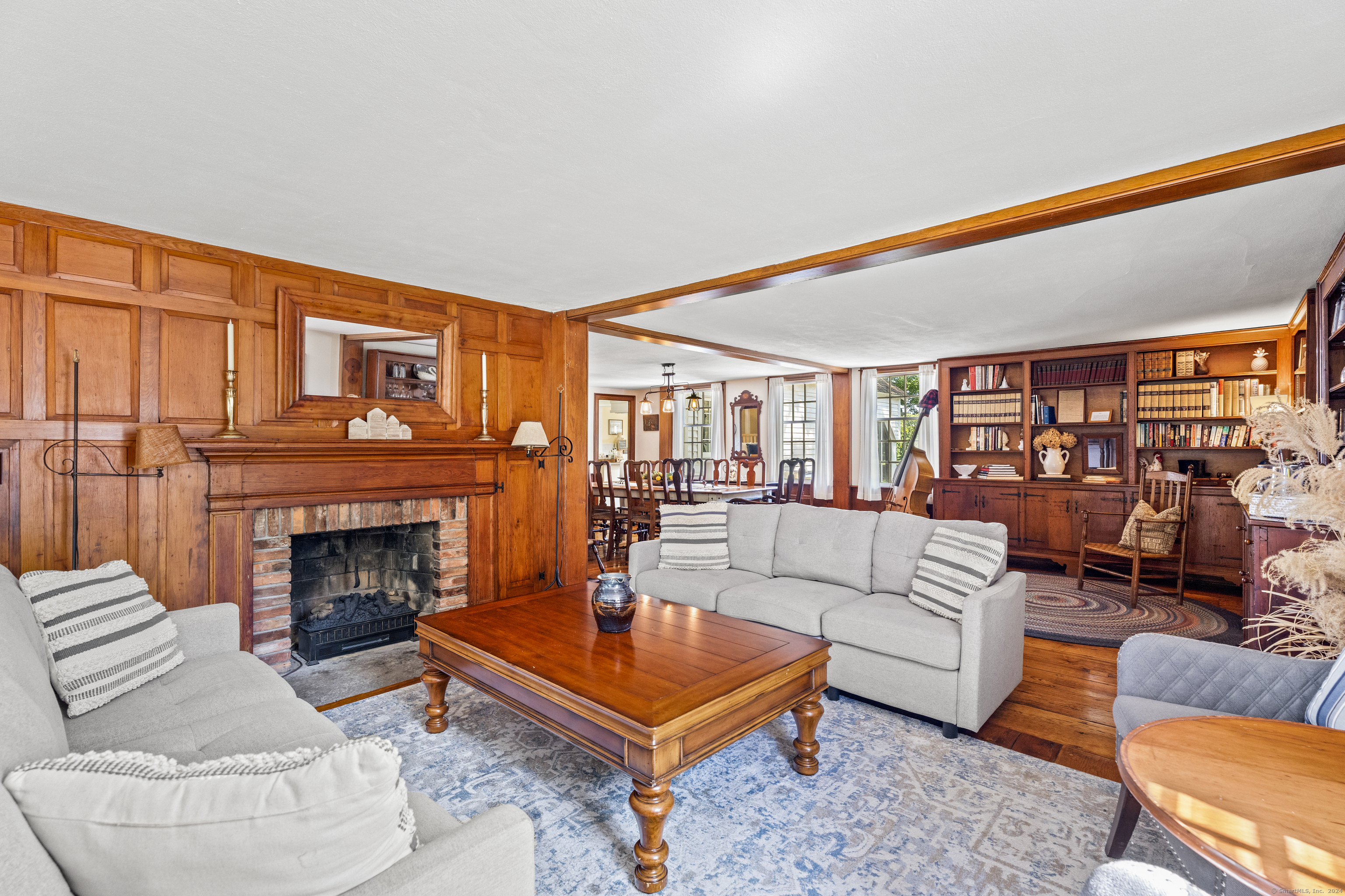 57 Northwest Corner Road Preston, CT 06365 - Photo 24 of 40 a living room with furniture a fireplace and city view