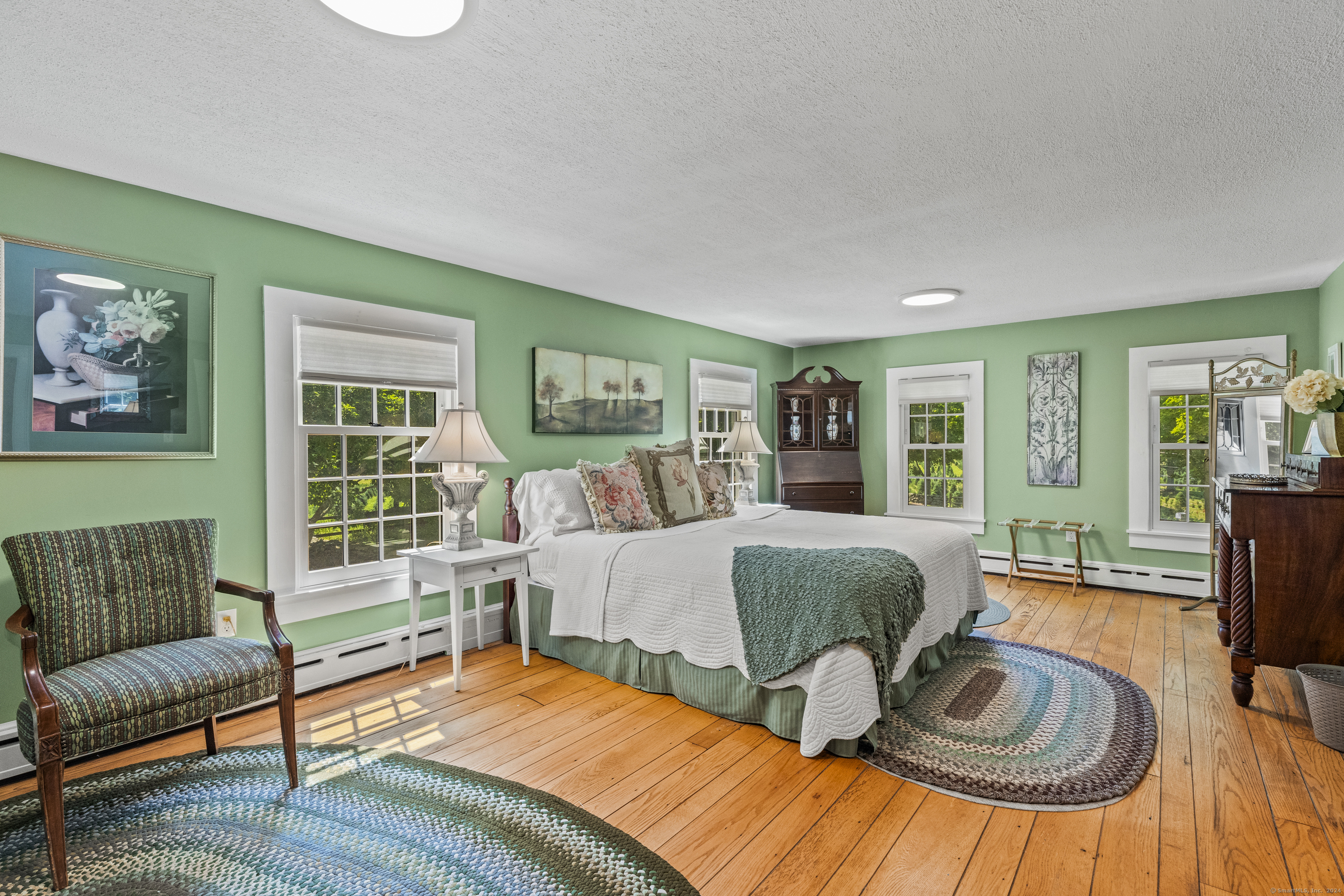 57 Northwest Corner Road Preston, CT 06365 - Photo 28 of 40 a living room with furniture and a large window