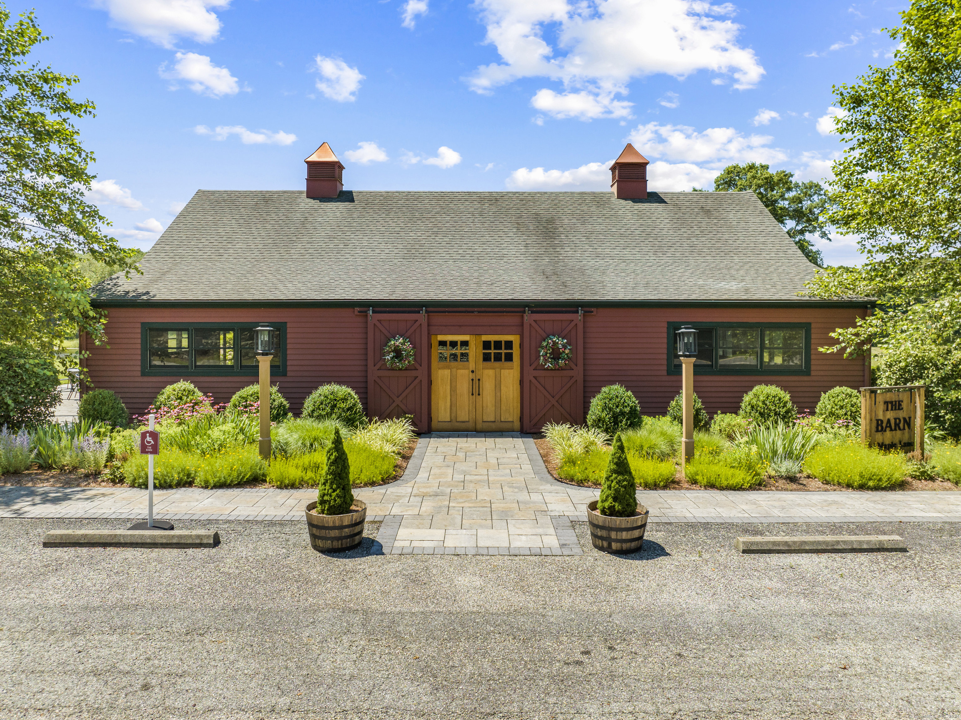 57 Northwest Corner Road Preston, CT 06365 - Photo 31 of 40 a view of a house with garden and pathway