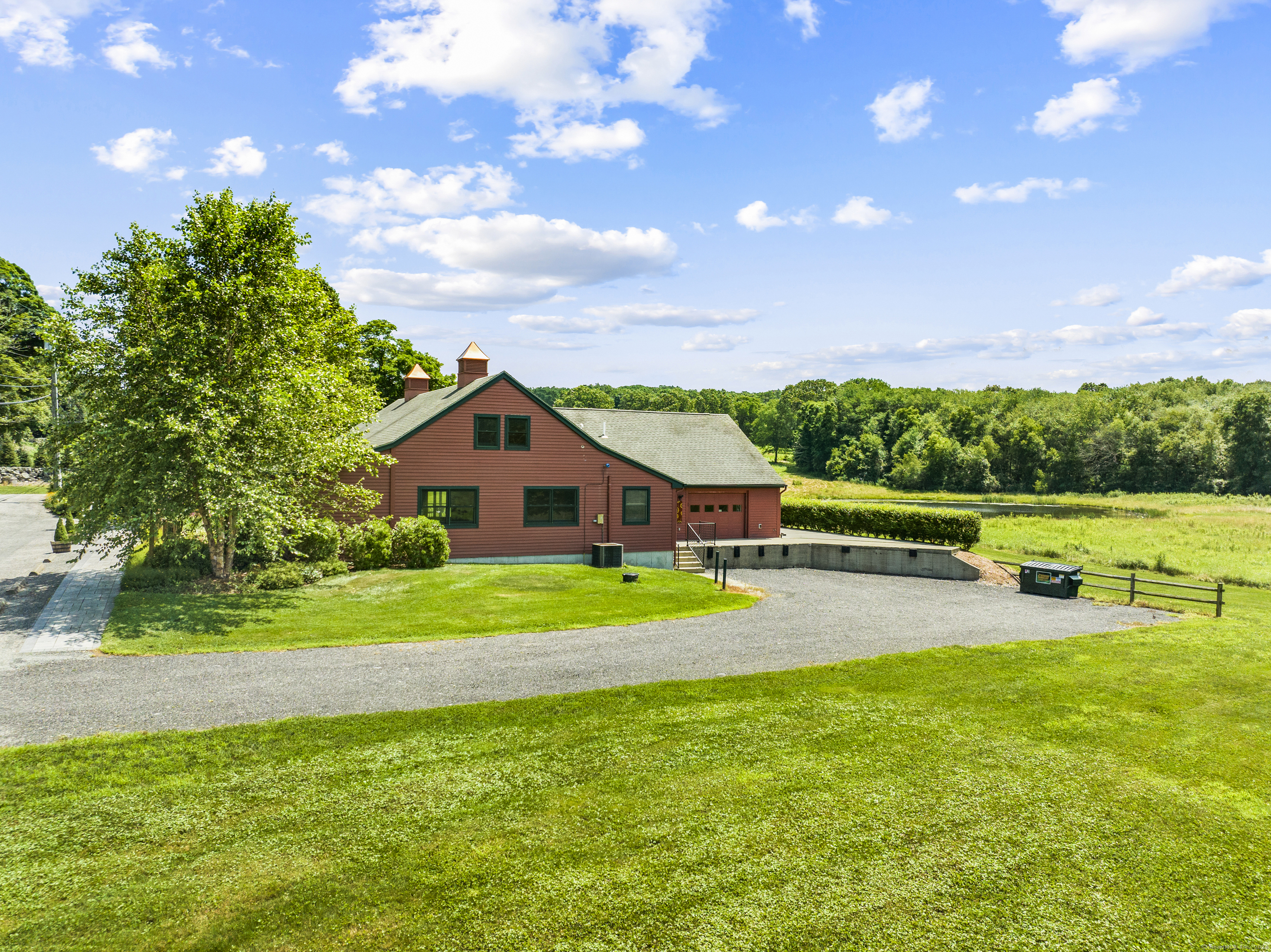 57 Northwest Corner Road Preston, CT 06365 - Photo 33 of 40 a view of a house with a big yard and a large tree