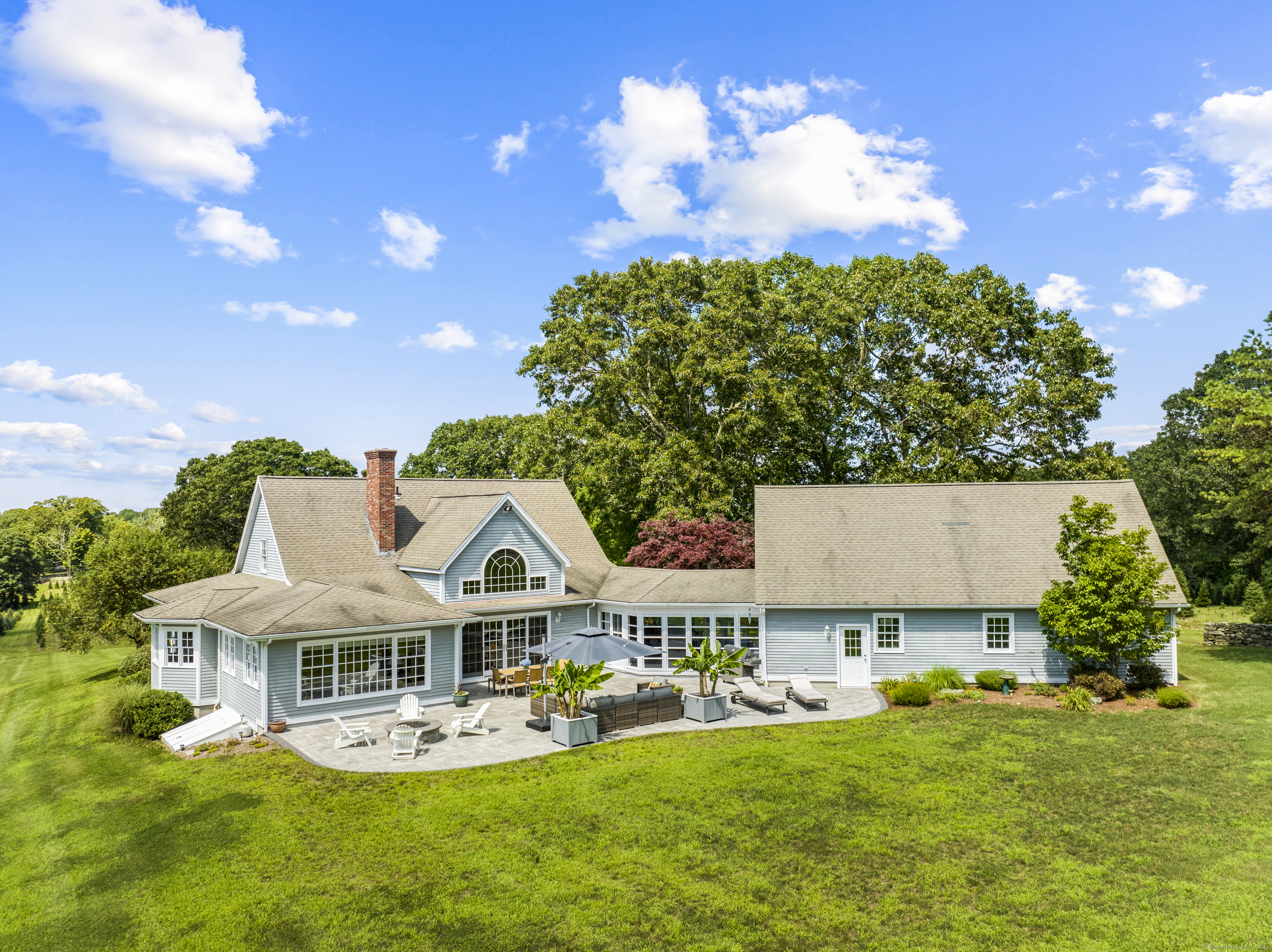 57 Northwest Corner Road Preston, CT 06365 - Photo 4 of 40 a view of a house with a big yard and potted plants