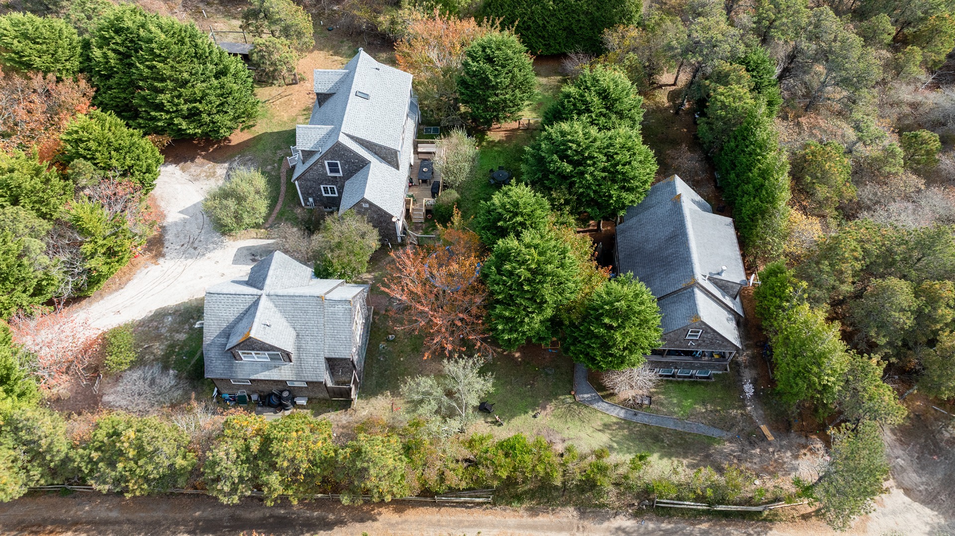 121 Surfside Road Nantucket, MA 02554 - Photo 3 of 9 an aerial view of a house