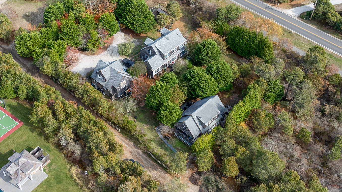 121 Surfside Road Nantucket, MA 02554 - Photo 5 of 9 an aerial view of a house with a yard
