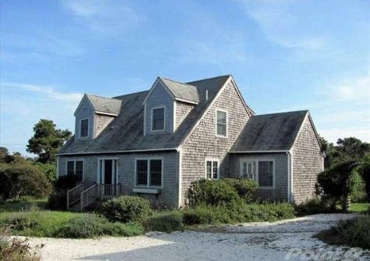 121 Surfside Road Nantucket, MA 02554 - Photo 9 of 9 a front view of house with a garden