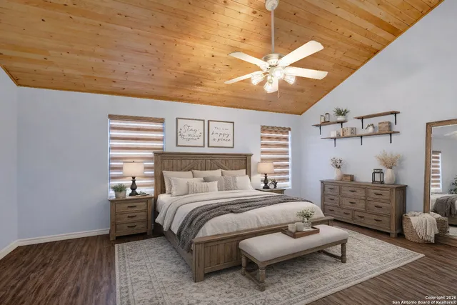 a bedroom with a bed and a dresser