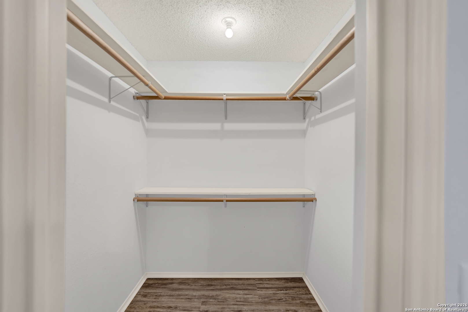 568 Firewheel Drive Bandera, TX 78003 - Photo 31 of 45 a view of an empty walk in closet