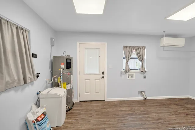 a view of a room with baby toys and wooden floor