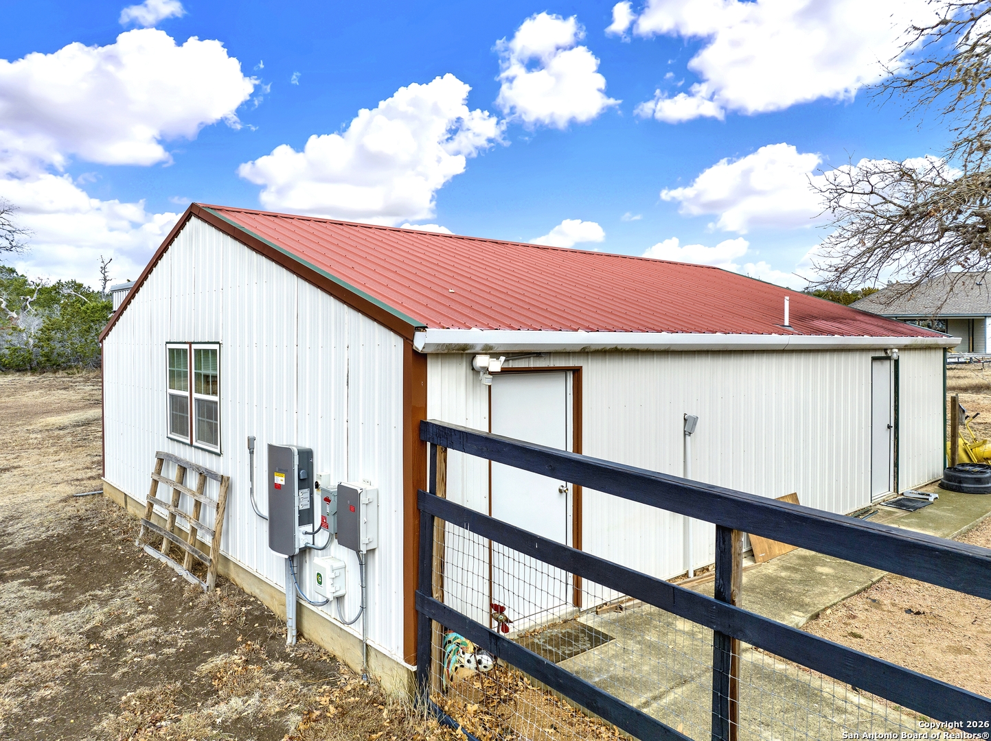 568 Firewheel Drive Bandera, TX 78003 - Photo 38 of 45 a view of backyard of house and wooden deck