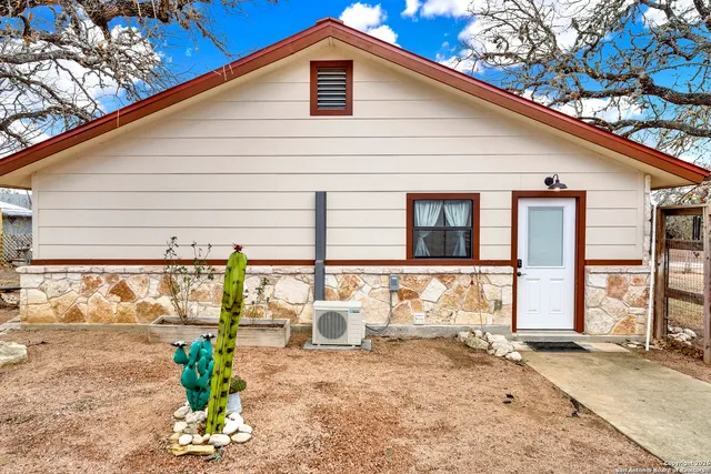 a front view of a house with patio
