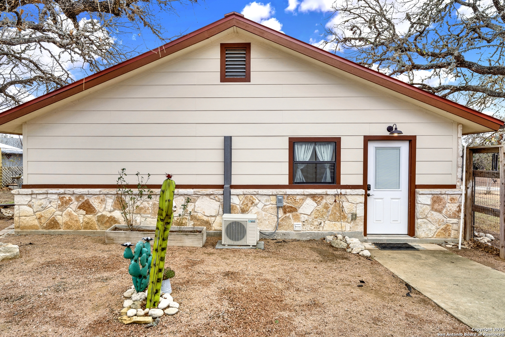 568 Firewheel Drive Bandera, TX 78003 - Photo 41 of 45 a front view of a house with patio