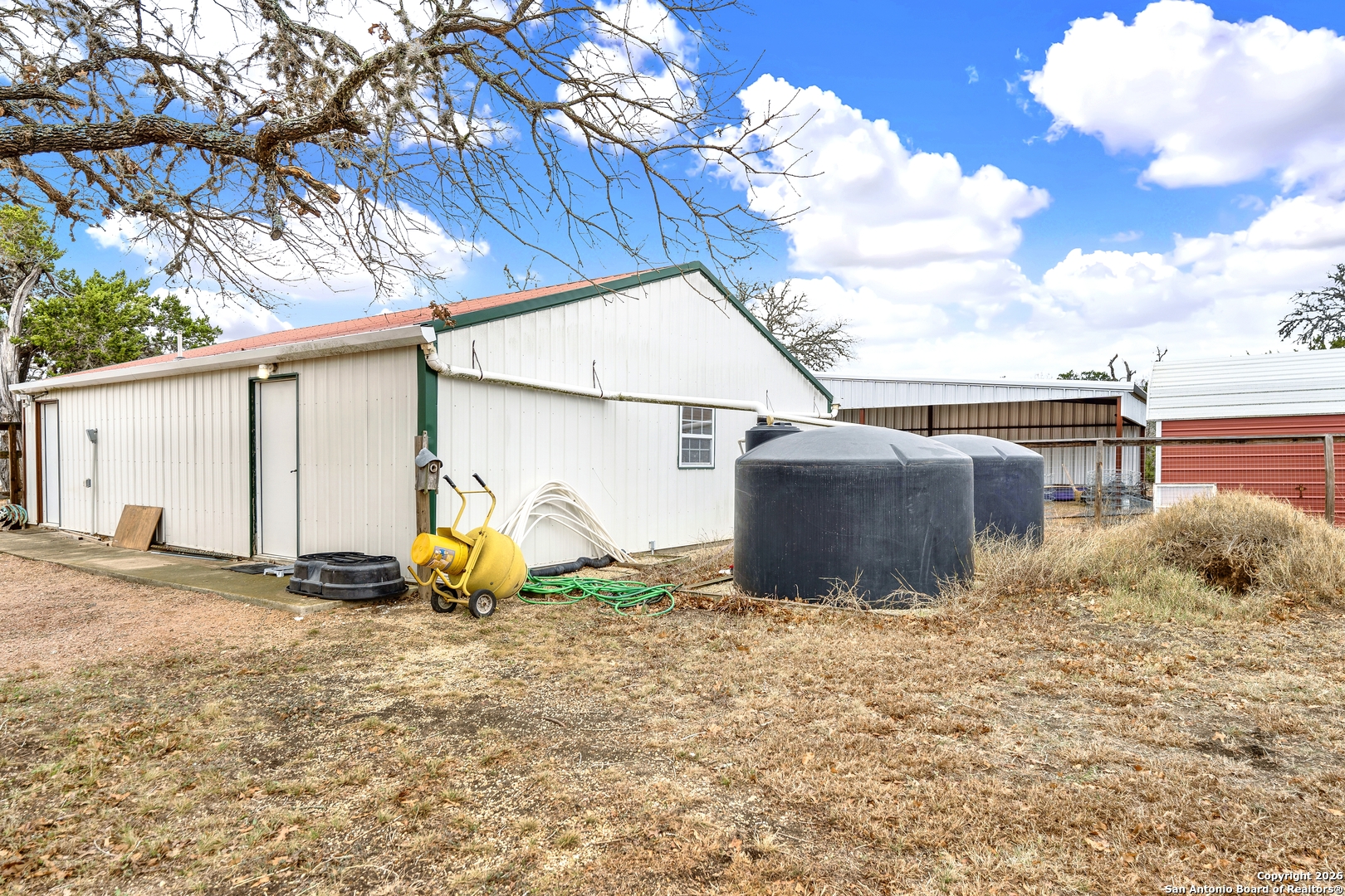 568 Firewheel Drive Bandera, TX 78003 - Photo 42 of 45 a view of the backyard of the house