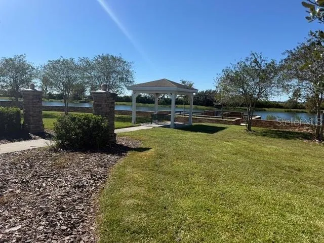 a view of a lake with a building in the background