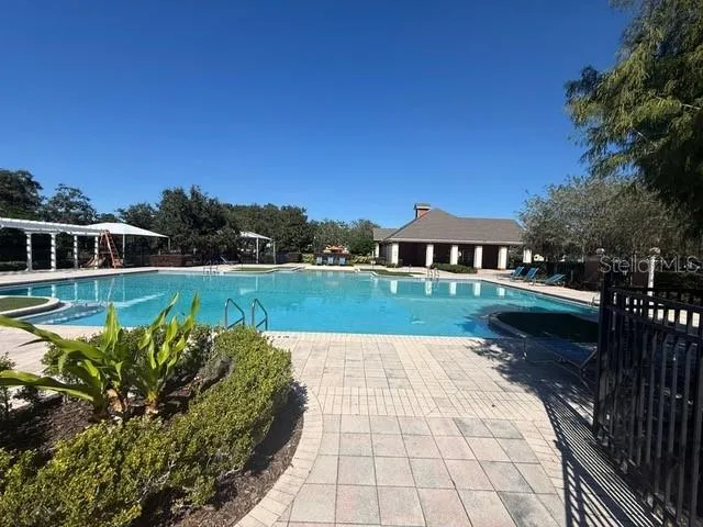 a view of a lake with a yard