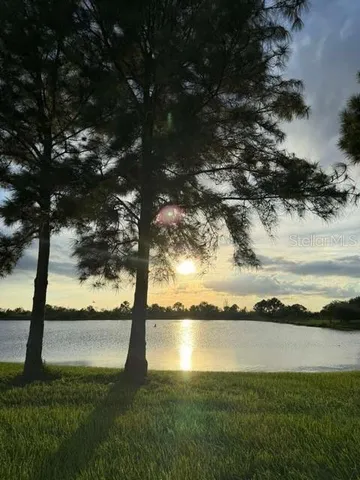 a view of lake from a mountain