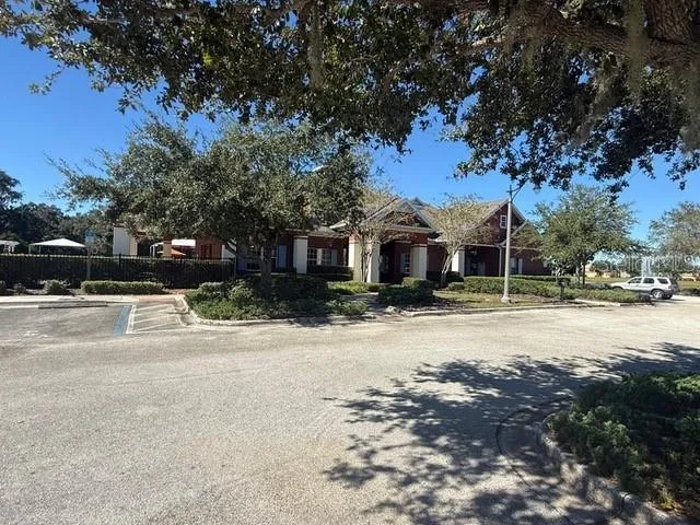a lobby with furniture and window